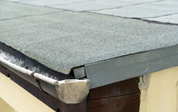 repair or replace The Ridge flat roofing?